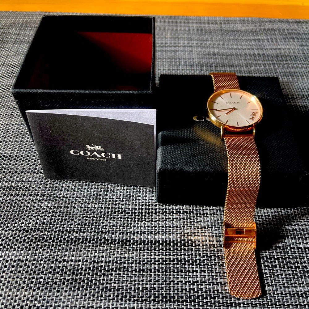 Rose gold colored (stainless steel material) Coach watch with box/Coach packet